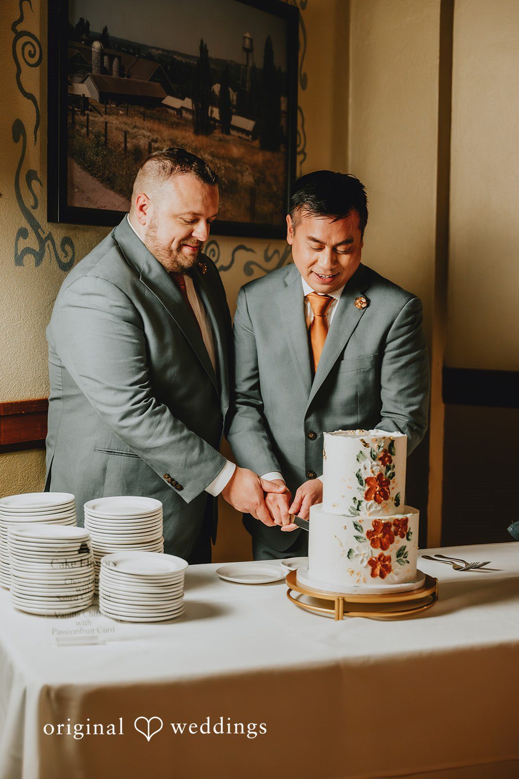 Benjamin + Tuan Newlyweds cutting their wedding cake