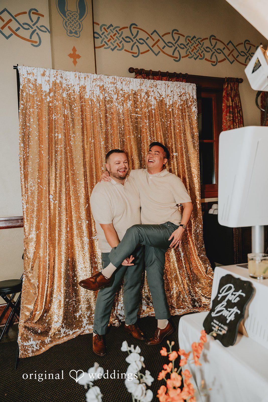 Benjamin + Tuan Grooms having fun at the photo booth