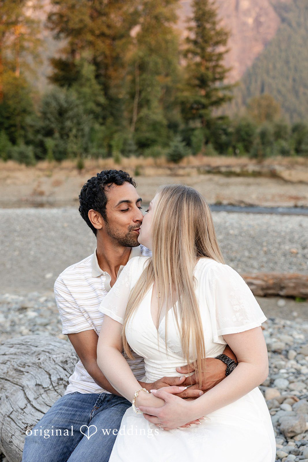 Leah + Joseph The couple takes a romantic kiss