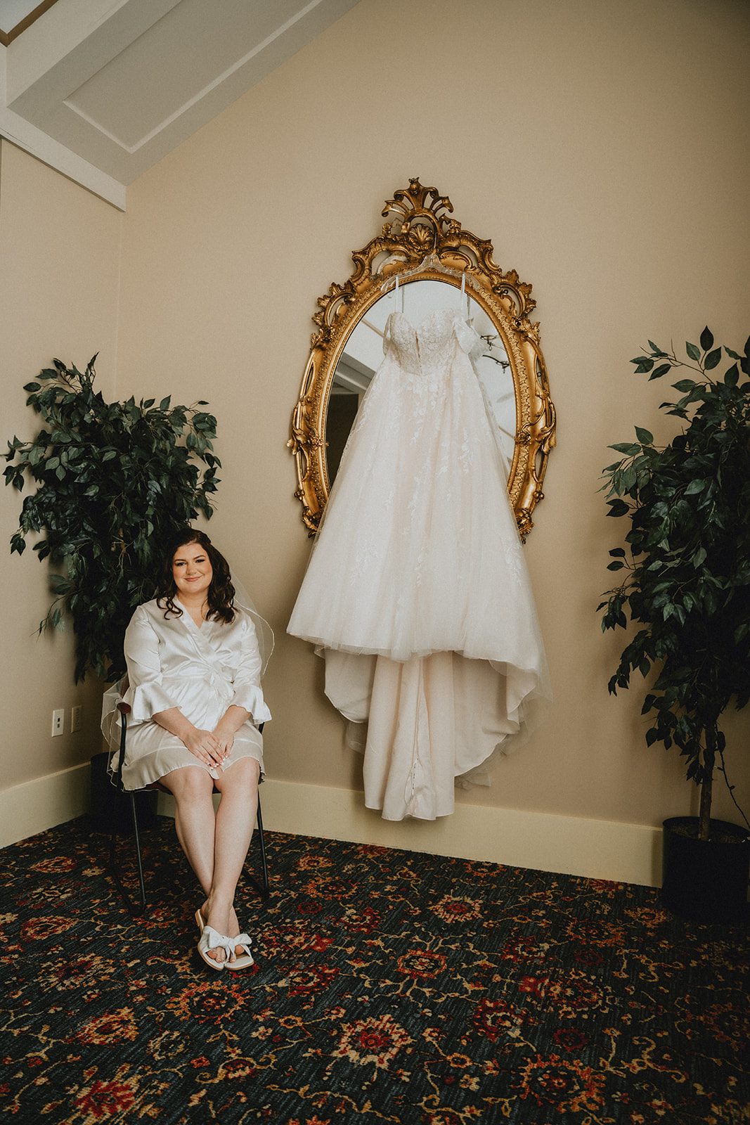 mechanics-hall-rustic-boston-brenna-walter-004-13 Wedding dress hanging in a gold framed mirror at Mechanics Hall