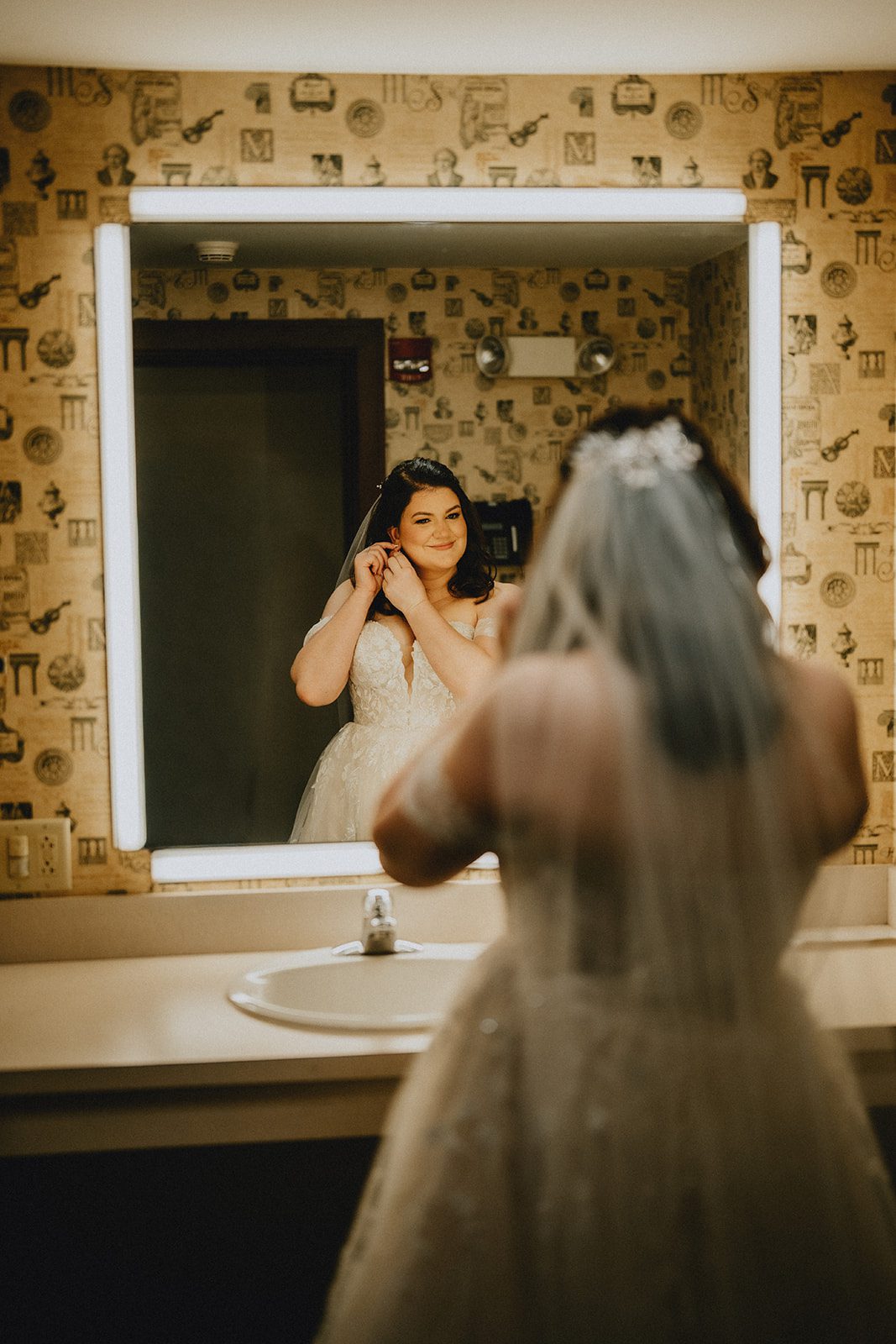 mechanics-hall-rustic-boston-brenna-walter-007-30 Bride checking her look in the mirror