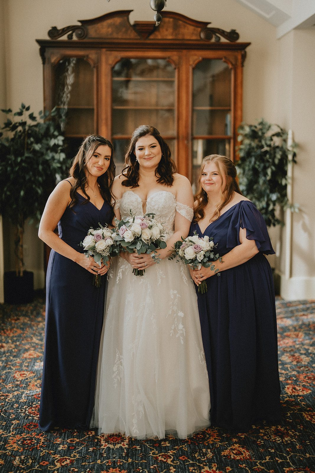 mechanics-hall-rustic-boston-brenna-walter-014-08 Bride with her bridesmaids in navy and blue