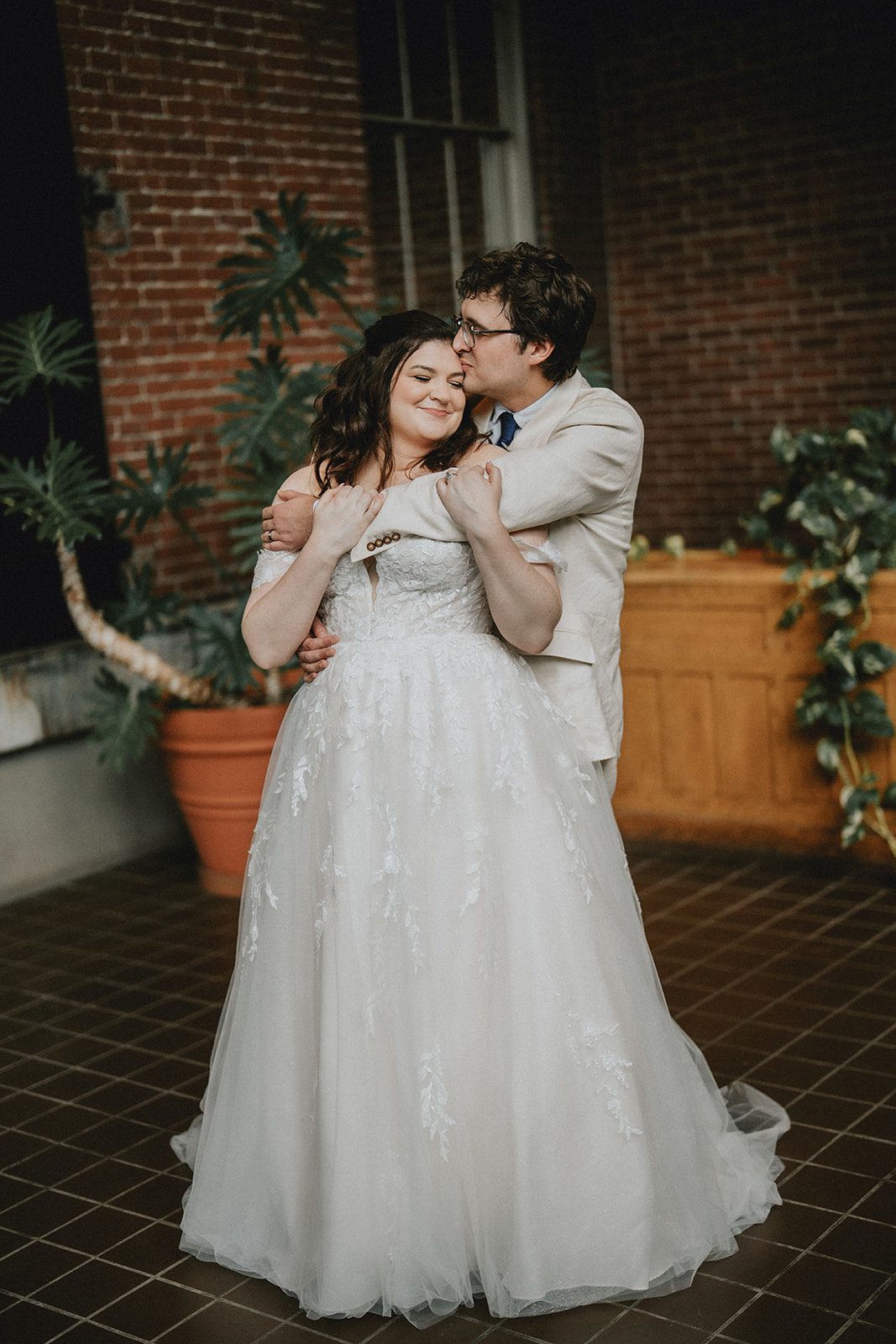 mechanics-hall-rustic-boston-brenna-walter-033-41 Couple posing by the brick wall