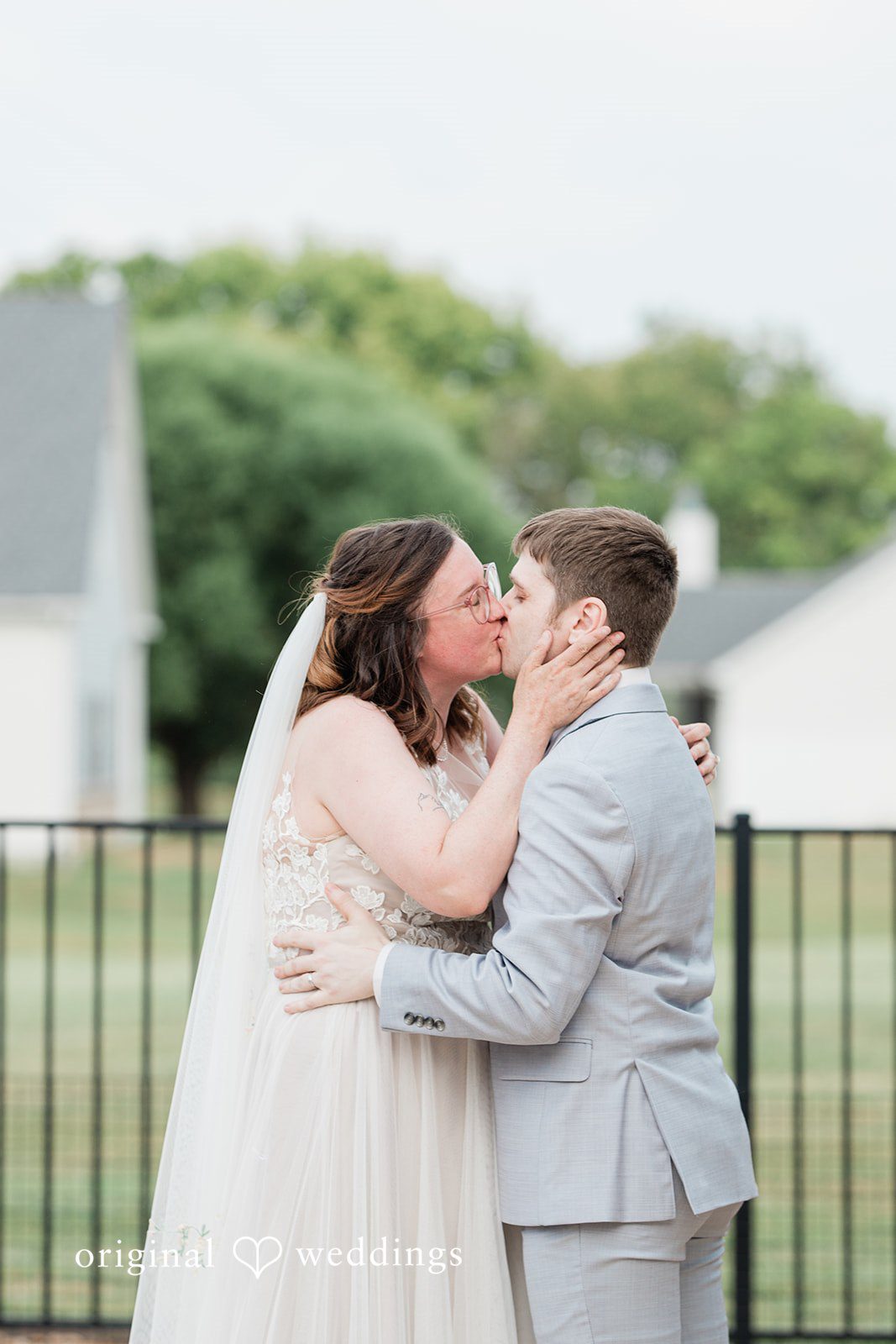 Nicole + Corey The couple takes their first kiss