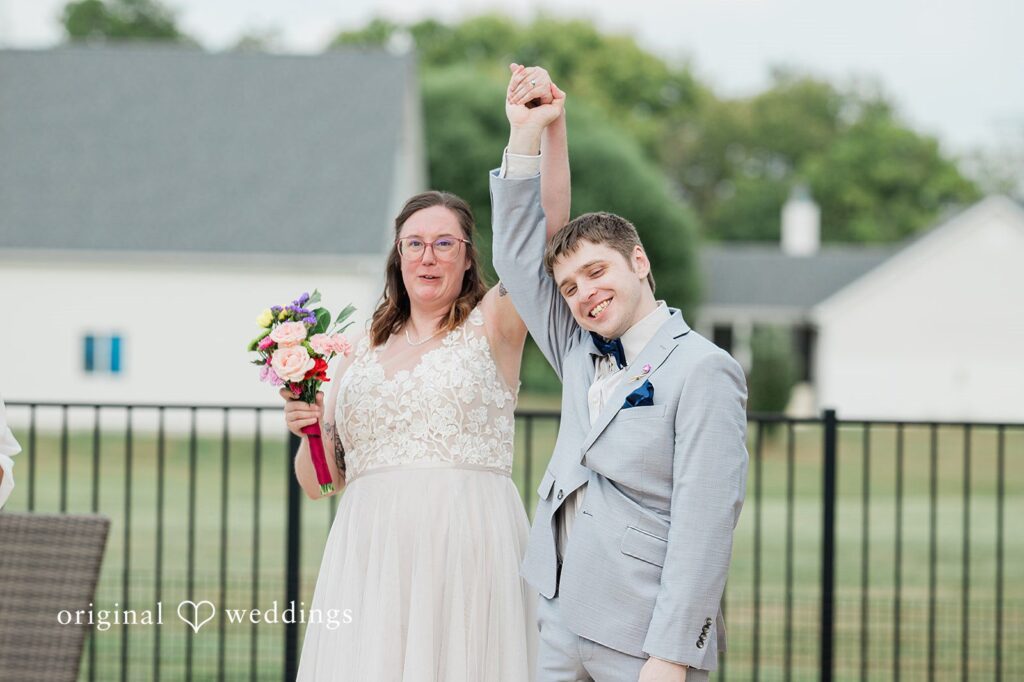 Nicole + Corey Our St. Louis wedding photographers captured a joyful moment of the couple from their Missouri Backyard Wedding