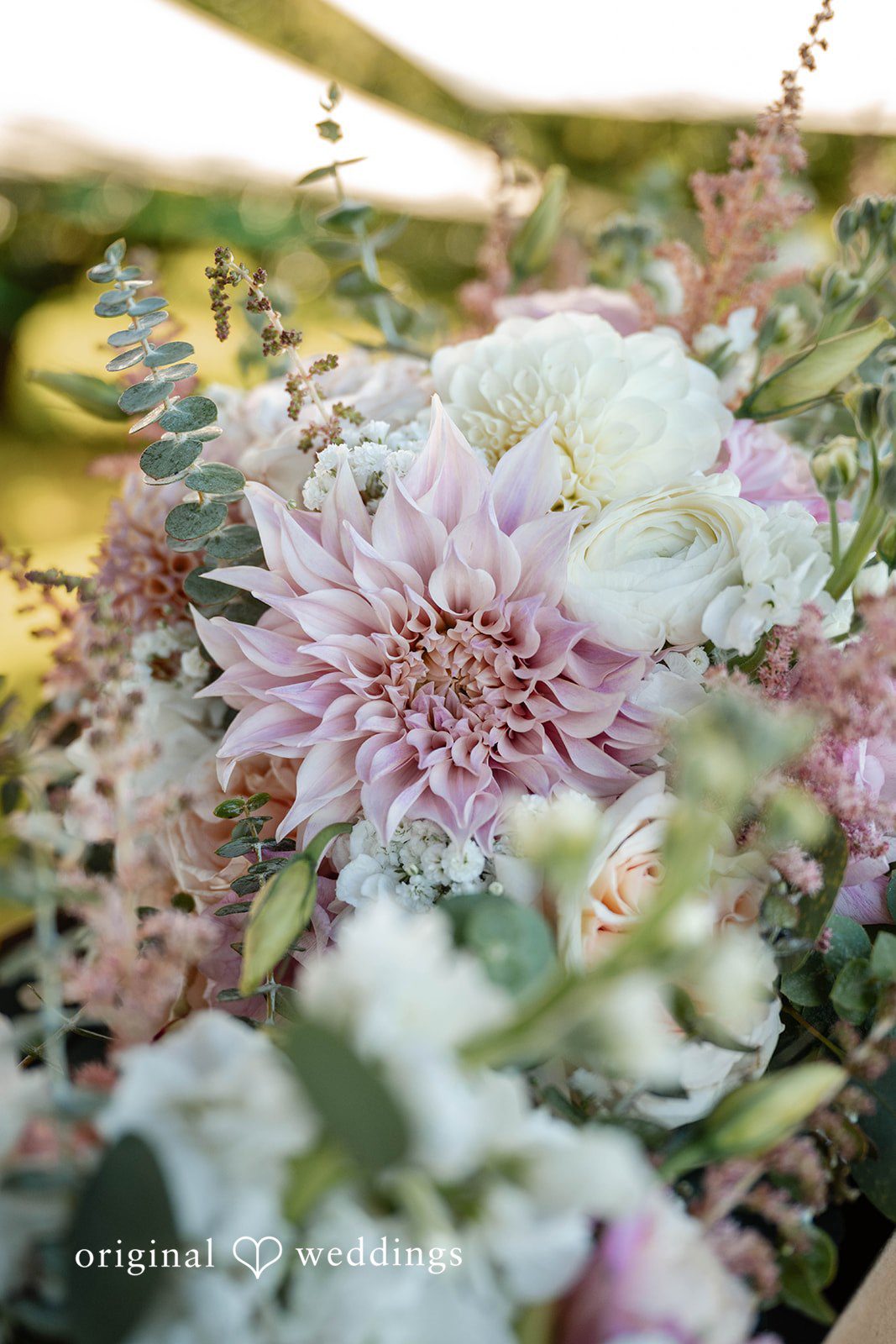 Close up of soft pink wedding flowers