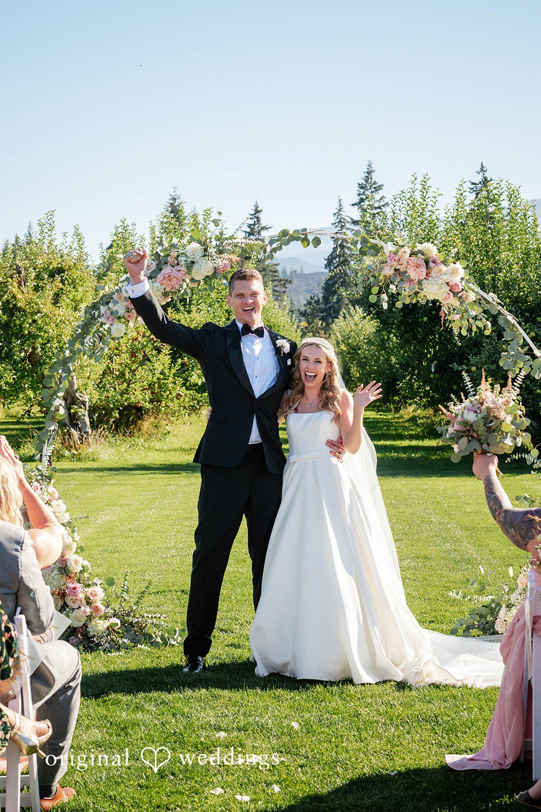 Couple exchanging vows outdoors