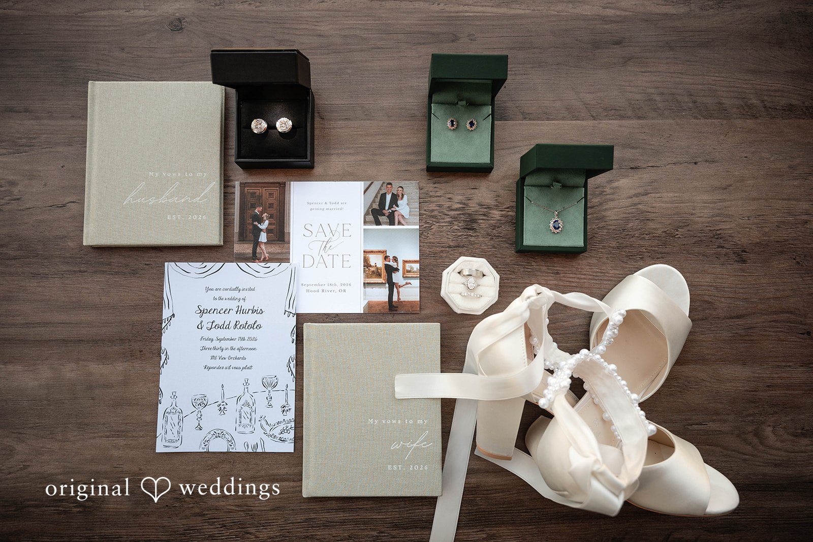 Wedding invitation, shoes and ring boxes in a flat lay