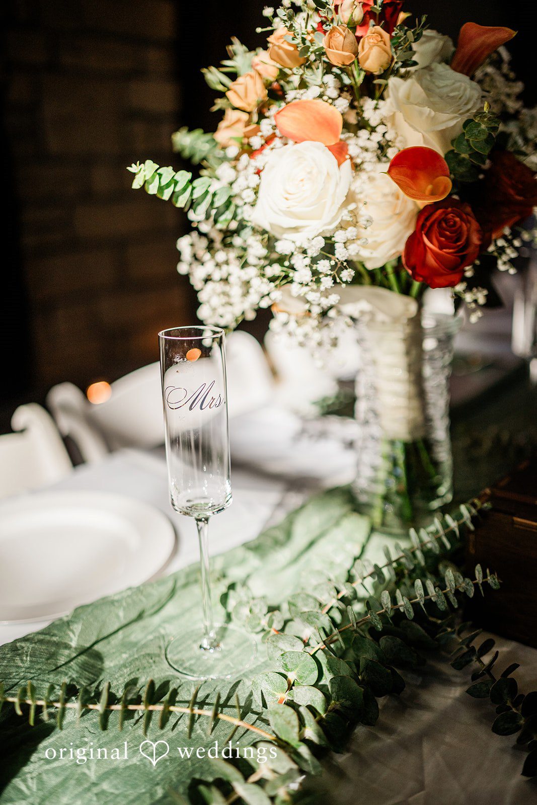Kensey + Jordan Floral centerpiece with candles