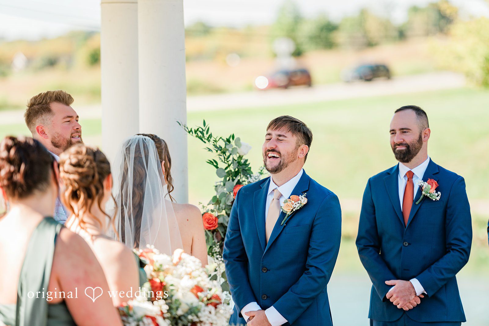Kensey + Jordan Groom smiling as the bride arrives