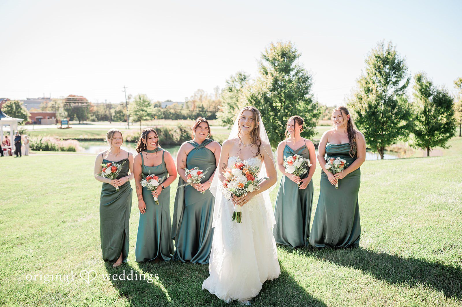 Kensey + Jordan Bride with her bridesmaids in sage dresses at Muhlhauser Barn