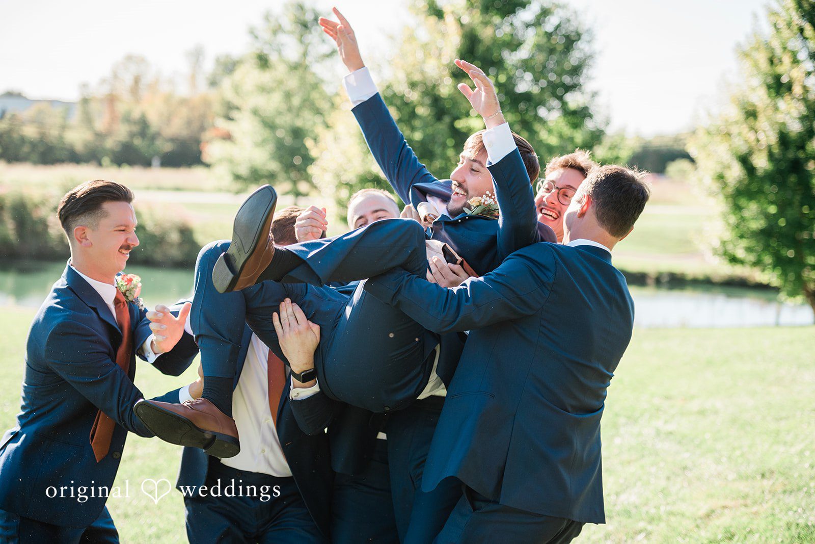 Kensey + Jordan Groomsmen lifting the groom