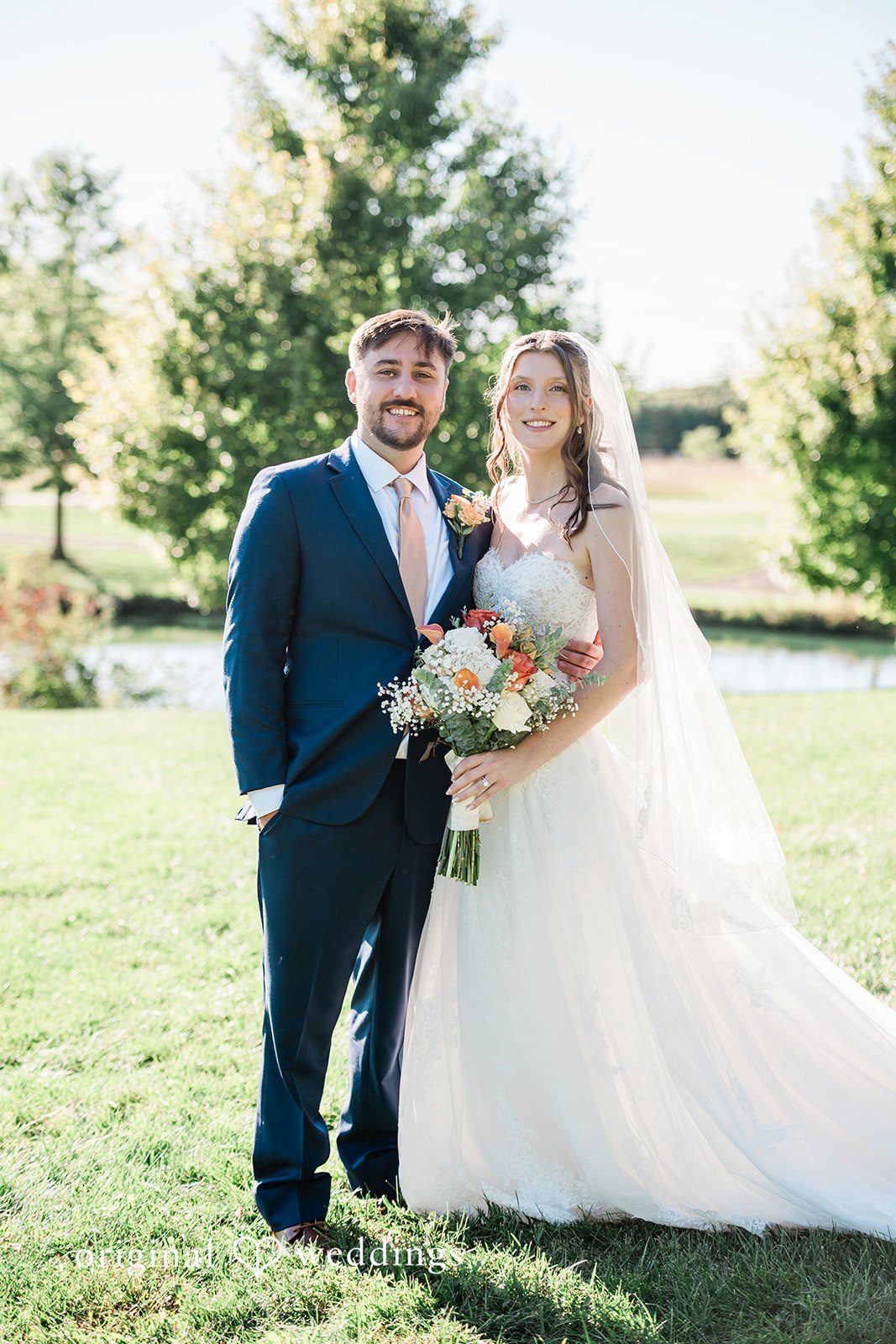 Kensey + Jordan Couple standing together on the lawn