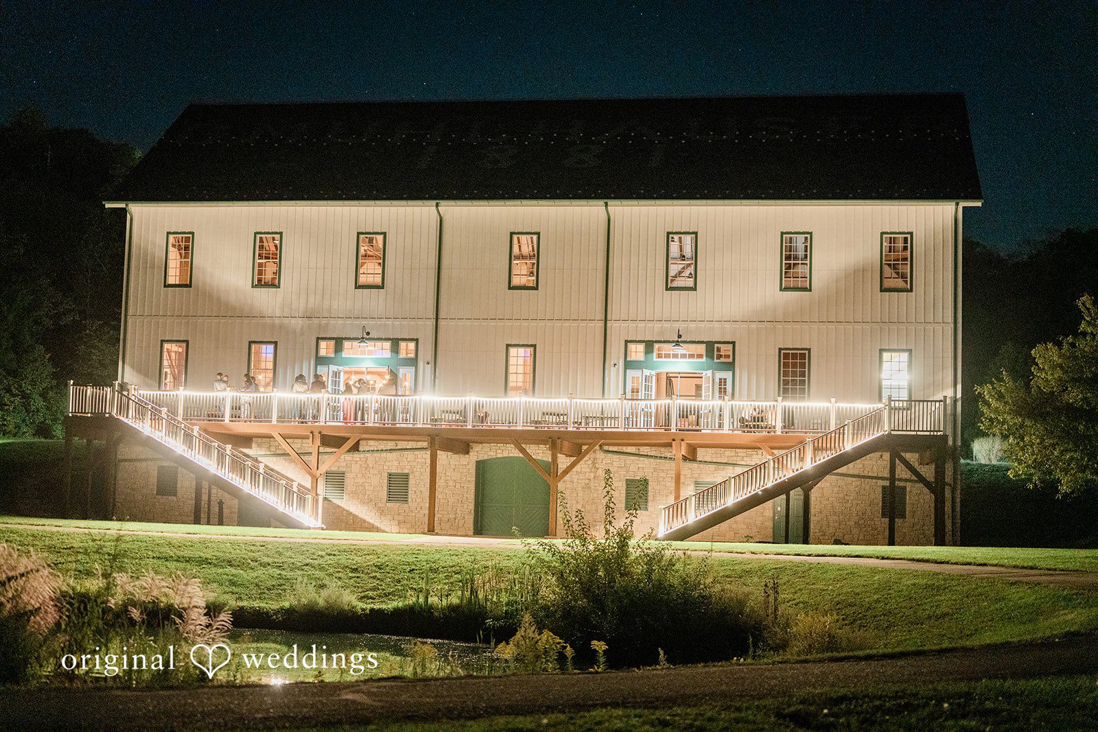 Kensey + Jordan Muhlhauser Barn glowing at night