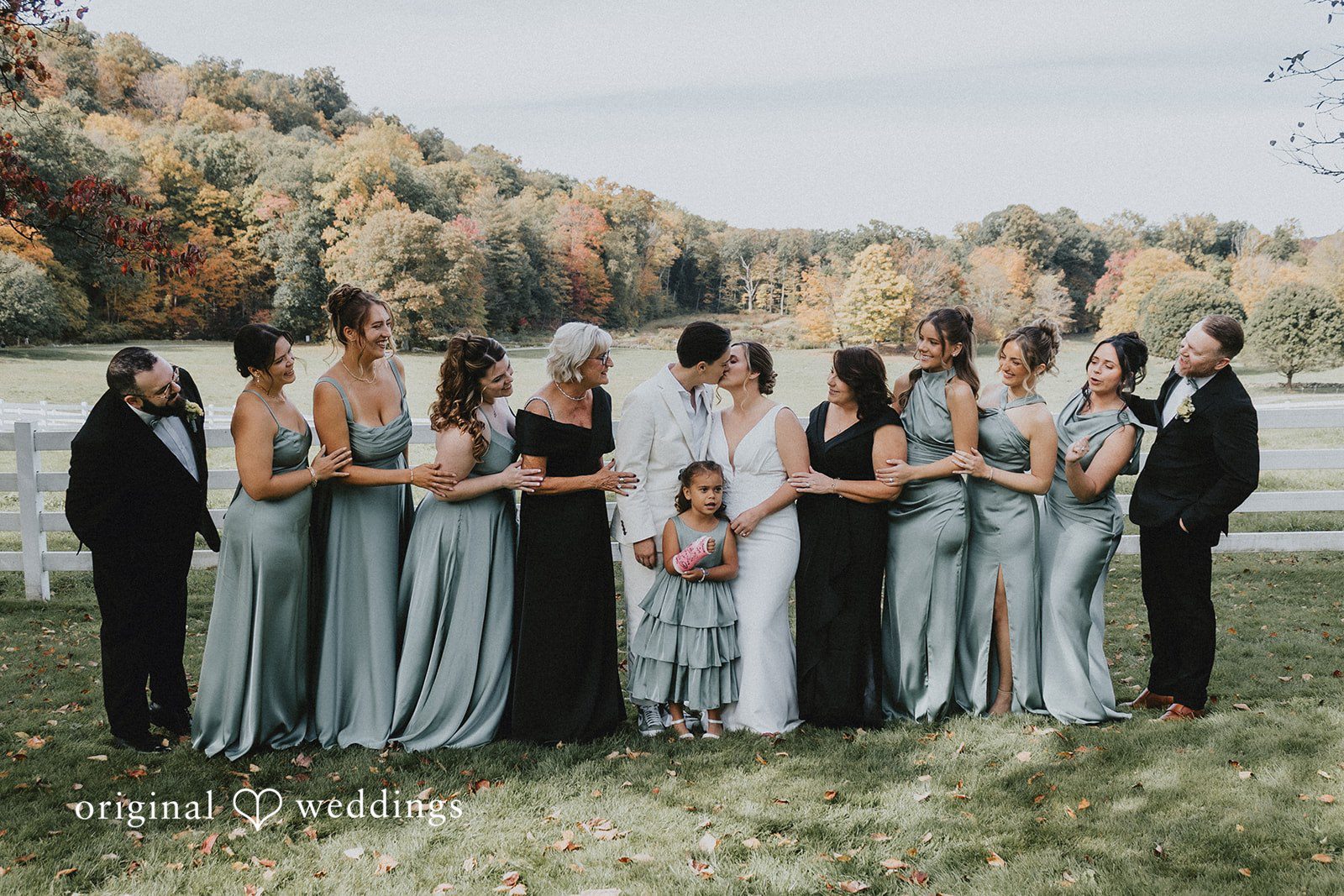 Rachel + Helen Our Hartford CT wedding photographers captured a romantic portrait of the couple with their bridal party