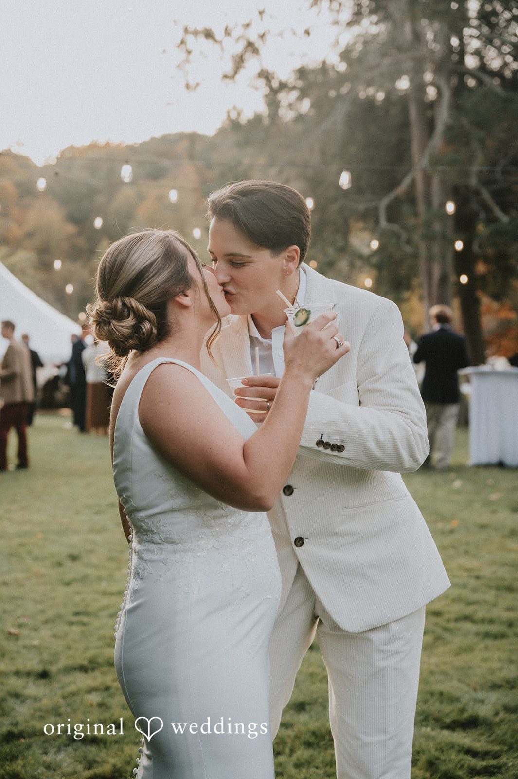 Rachel + Helen The couple takes a romantic kiss