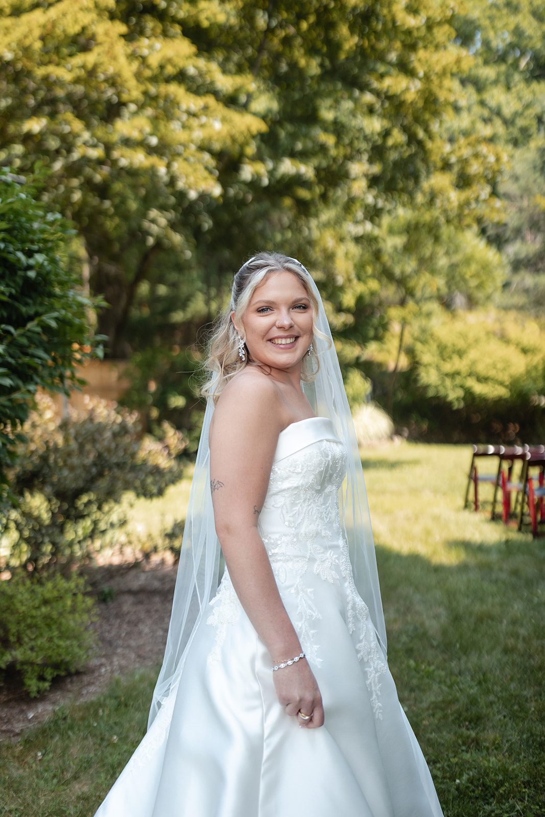new-york-backyard-timeless-new-york-taylor-andrew-p006-23 Bride in her strapless gown at a New York backyard wedding