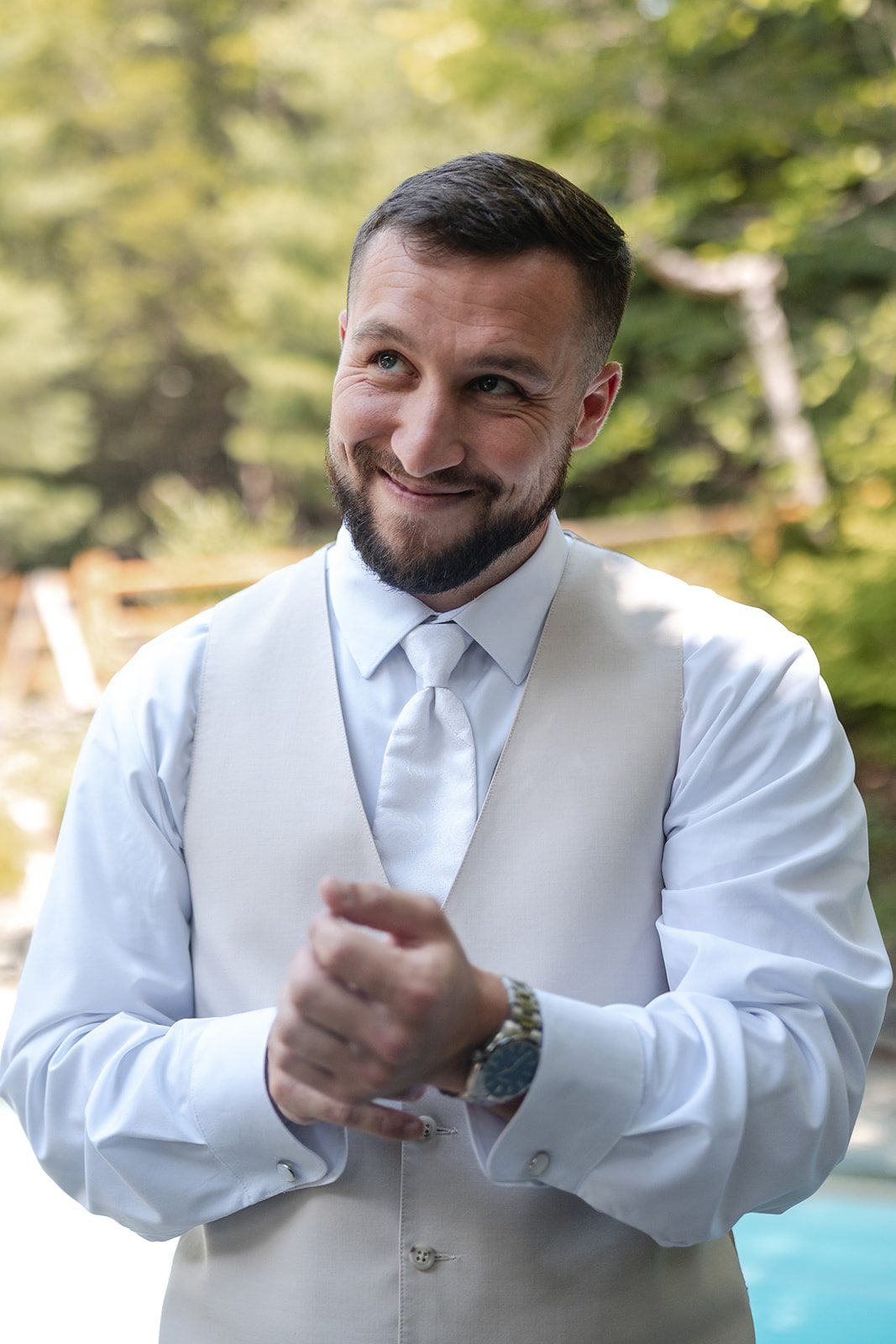 new-york-backyard-timeless-new-york-taylor-andrew-p008-24 Groom smiling before the ceremony
