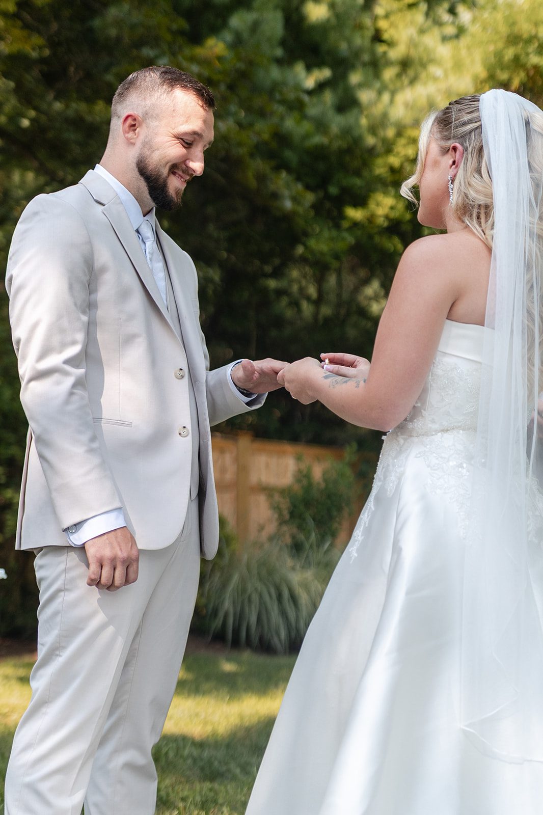 new-york-backyard-timeless-new-york-taylor-andrew-p013-12 Bride and groom exchanging vows