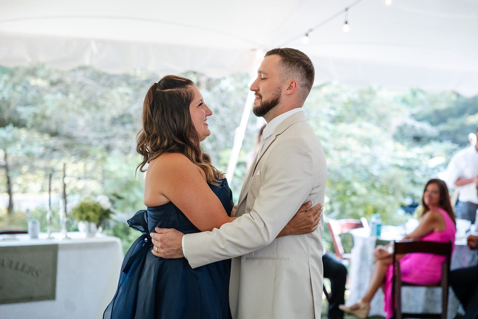 new-york-backyard-timeless-new-york-taylor-andrew-p024-26 Couple greeting guests at the reception