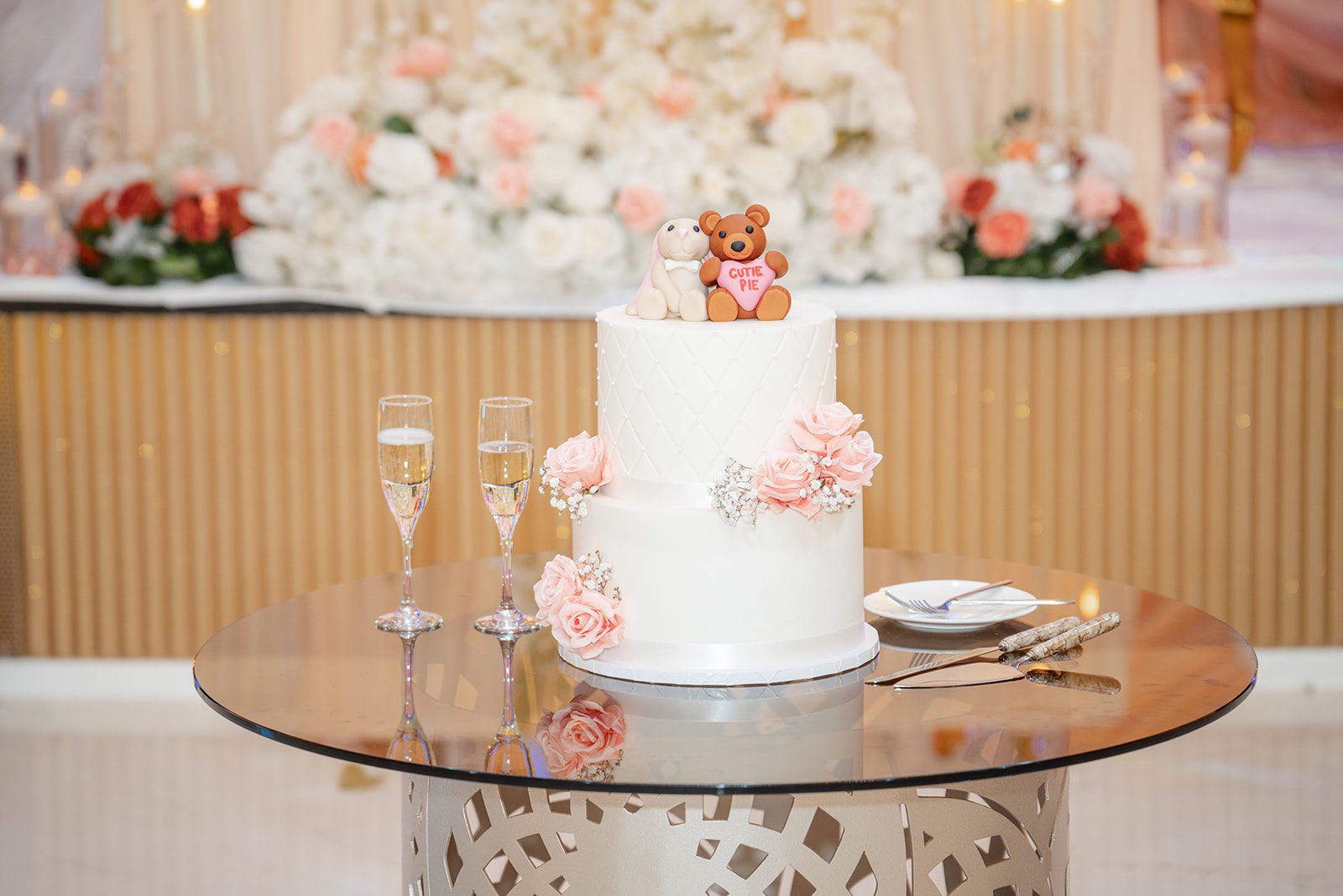 nuur-event-center-timeless-denver-henok-elshadaye-p002-33 Tall white wedding cake with gold accents