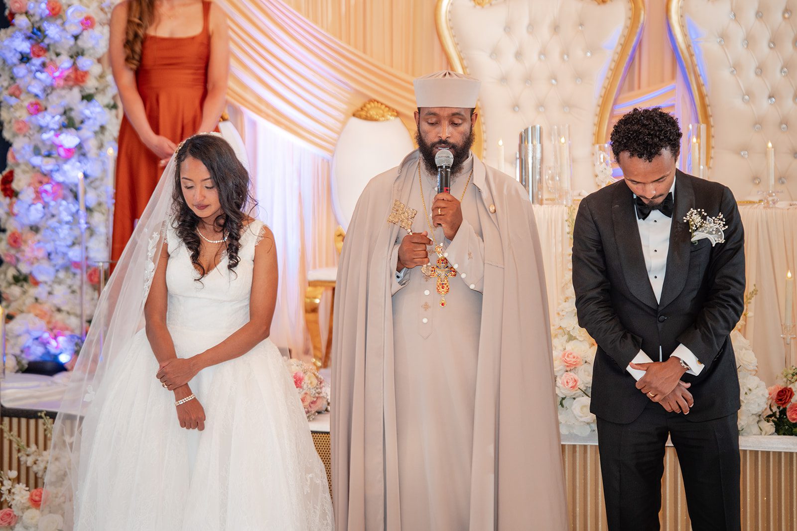 nuur-event-center-timeless-denver-henok-elshadaye-p012-28 Officiant leading the indoor ceremony