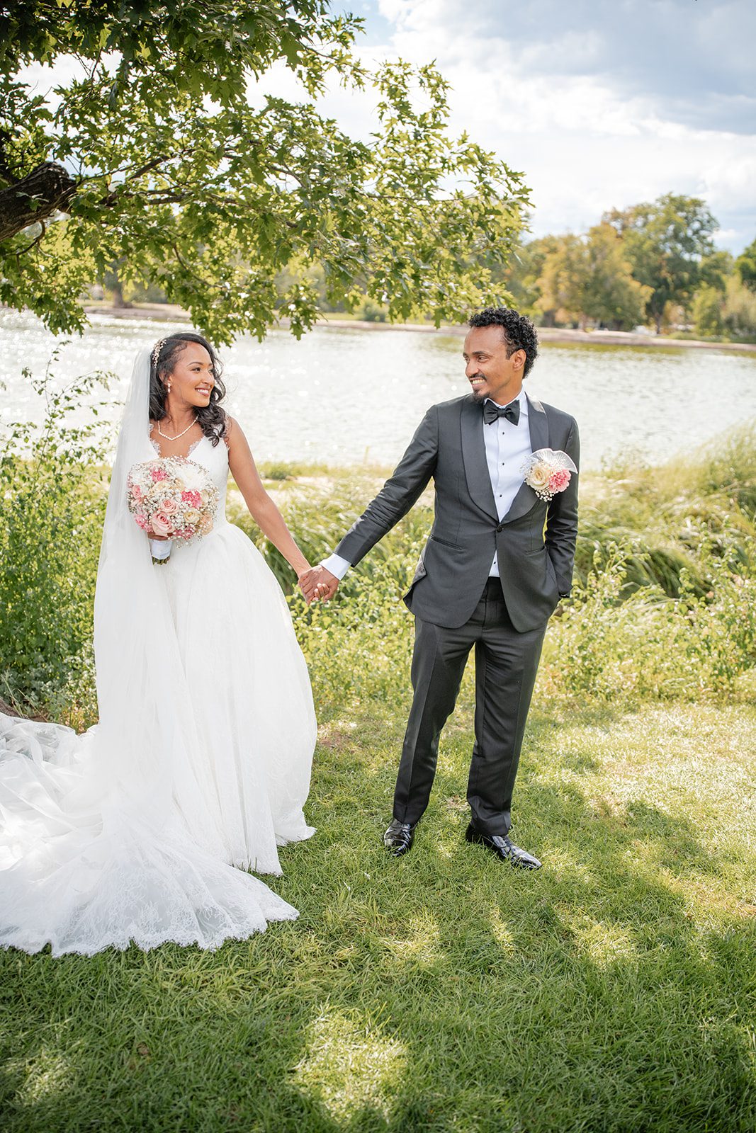 nuur-event-center-timeless-denver-henok-elshadaye-p018-14 Bride and groom by the water