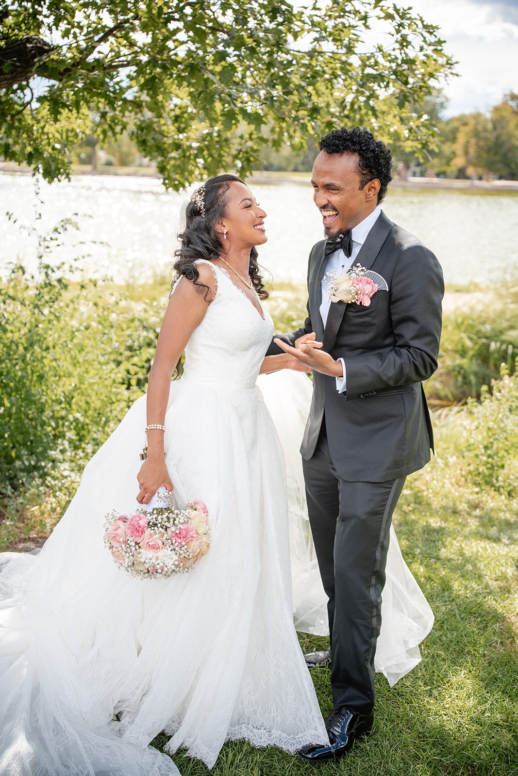 nuur-event-center-timeless-denver-henok-elshadaye-p019-03 Couple laughing together near the lake