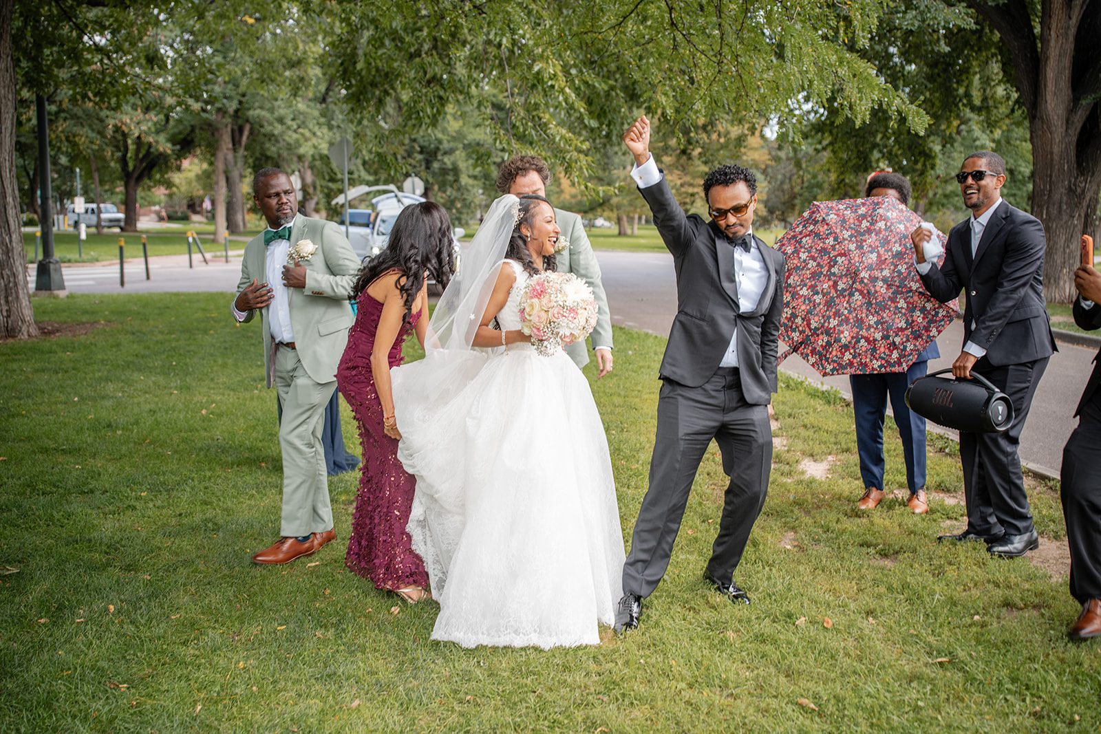 nuur-event-center-timeless-denver-henok-elshadaye-p022-02 Wedding party celebrating in the park