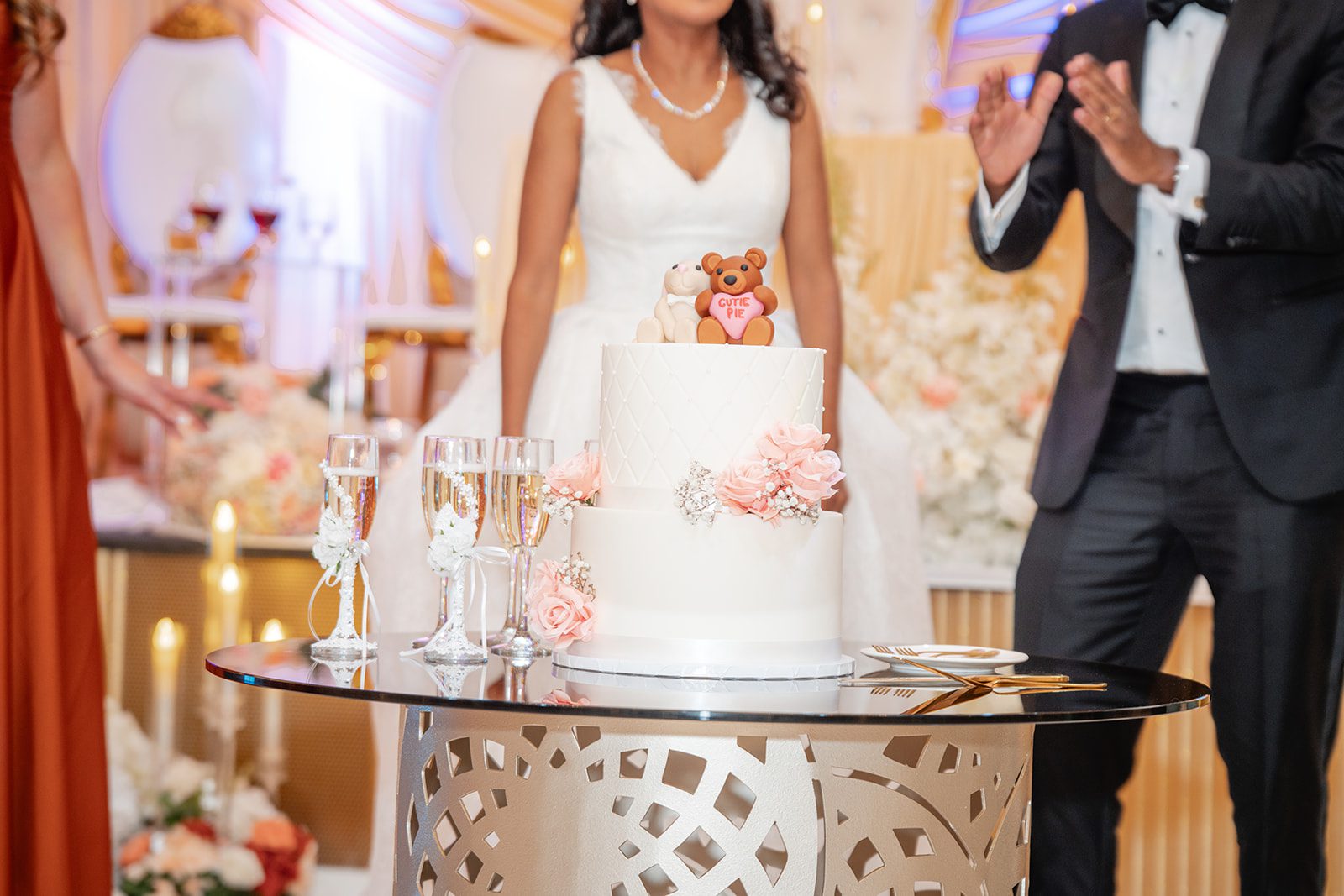 nuur-event-center-timeless-denver-henok-elshadaye-p029-29 Bride and groom cutting their wedding cake at Nuur Event Center