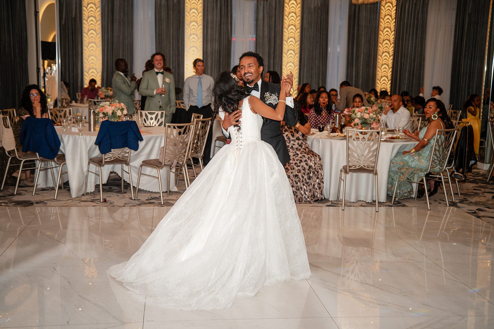 nuur-event-center-timeless-denver-henok-elshadaye-p036-23 Bride twirling on the dance floor