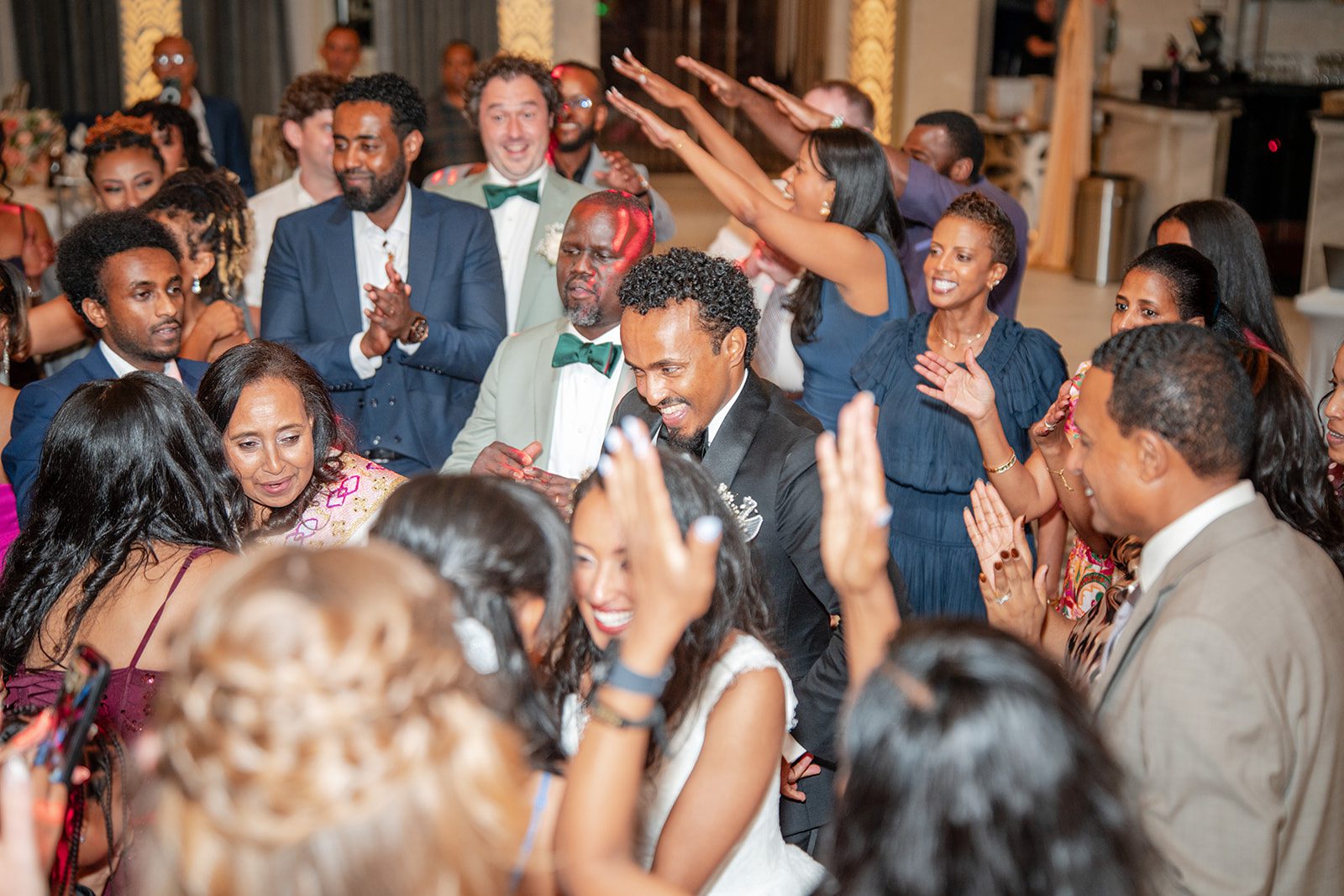 nuur-event-center-timeless-denver-henok-elshadaye-p038-24 Guests celebrating on the dance floor