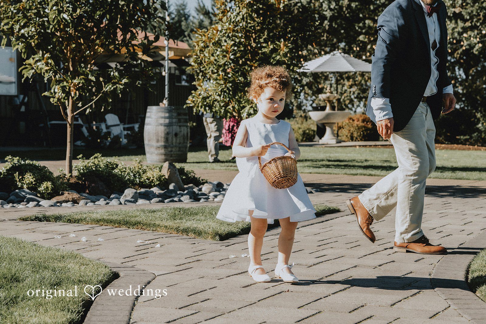 Flower girl walking down the aisle