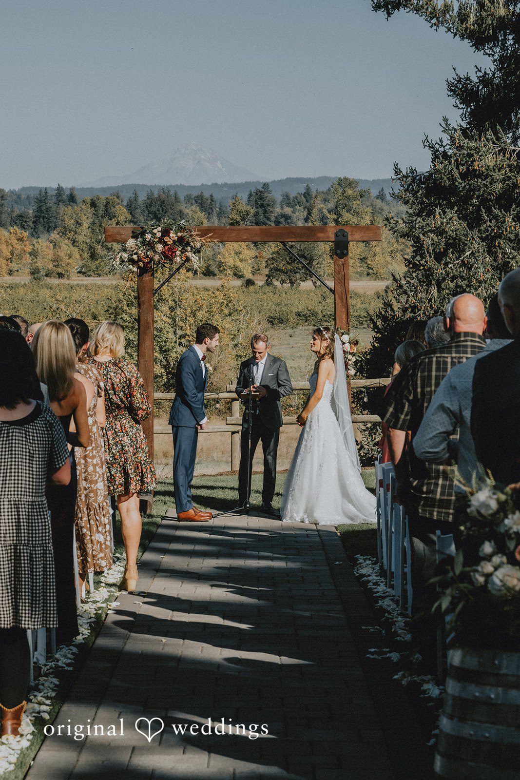 Bride walking down the aisle at Oak & Hood