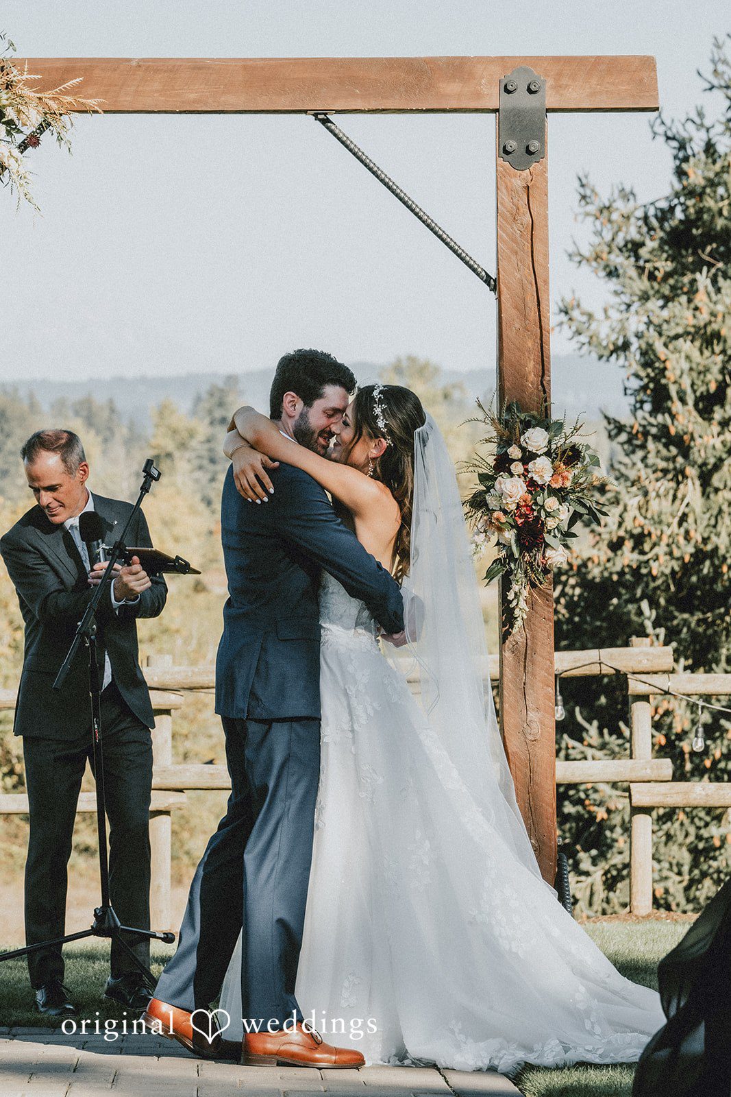 Couple at the ceremony arch