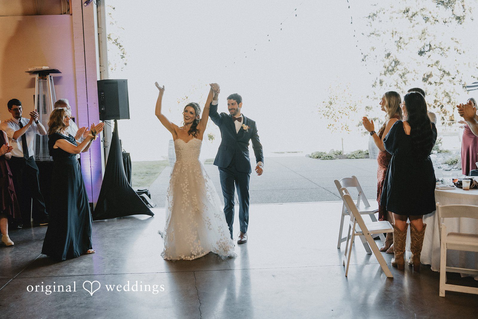 Couple making their reception entrance