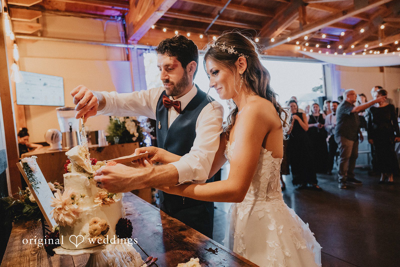 Couple cutting the wedding cake