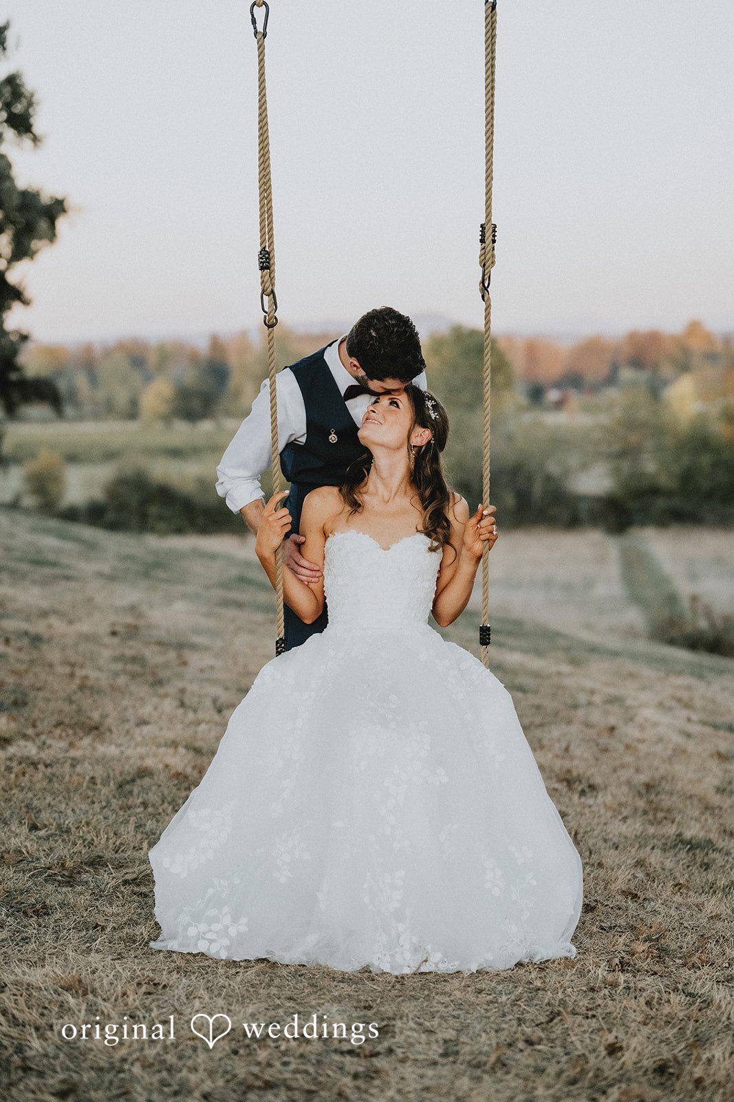 Bride standing on the grounds at Oak & Hood