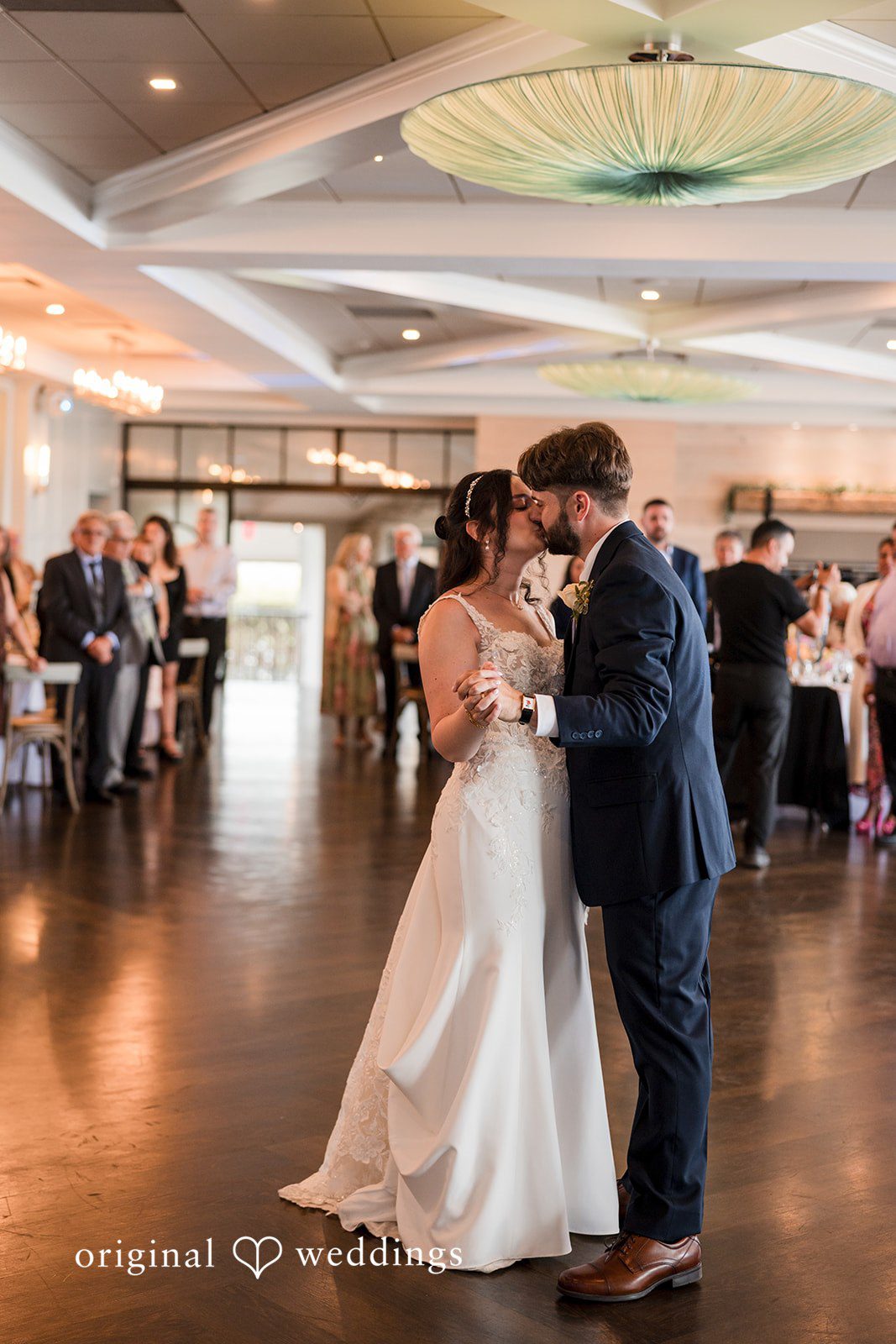 Francesca + Steven The couple shares a romantic kiss