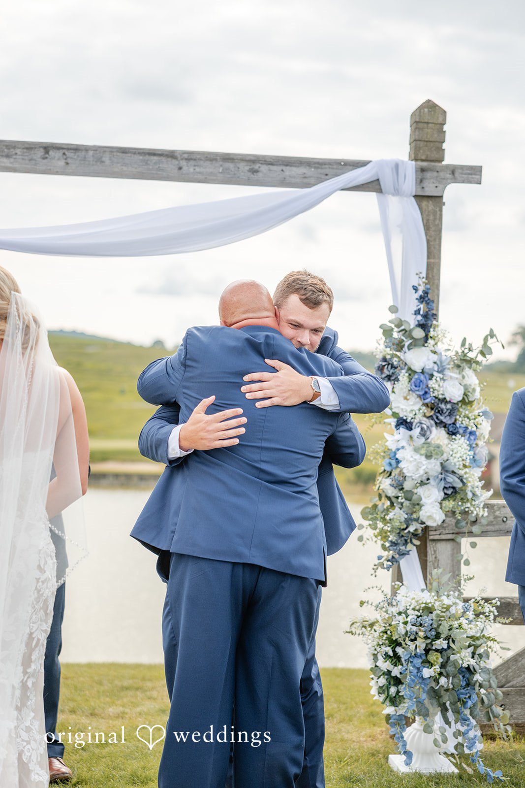 Taylor + Grady In an emotional moment, the groom and the bride's father shared a hug