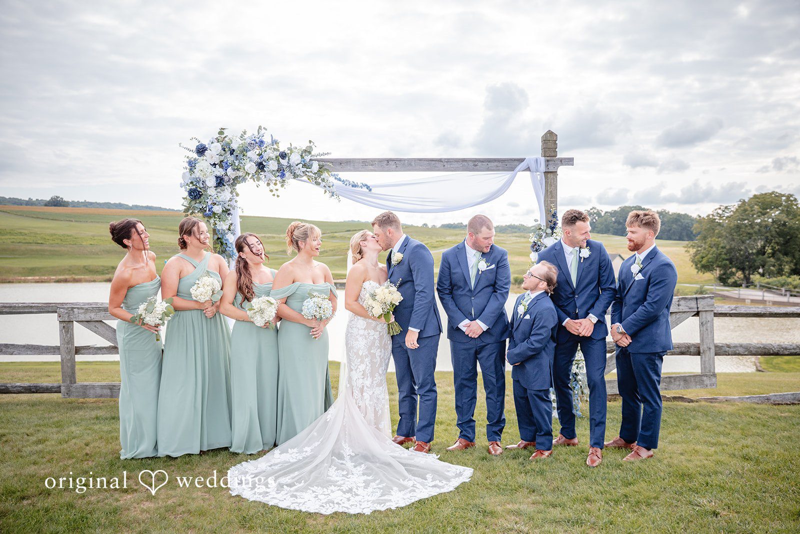 Taylor + Grady A romantic portrait of the couple with their bridal party