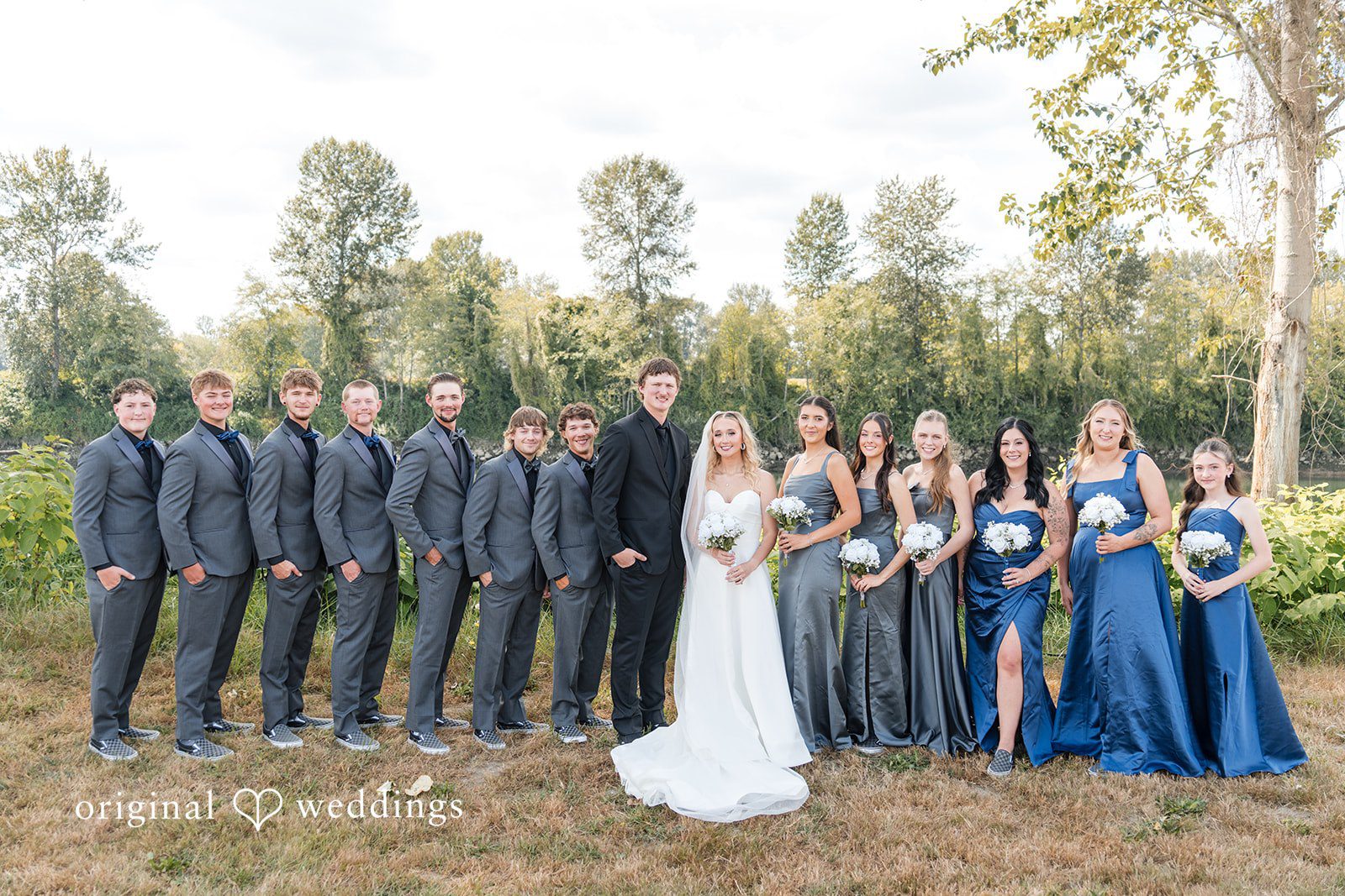 Baylee + Jackson Couple with the full wedding party