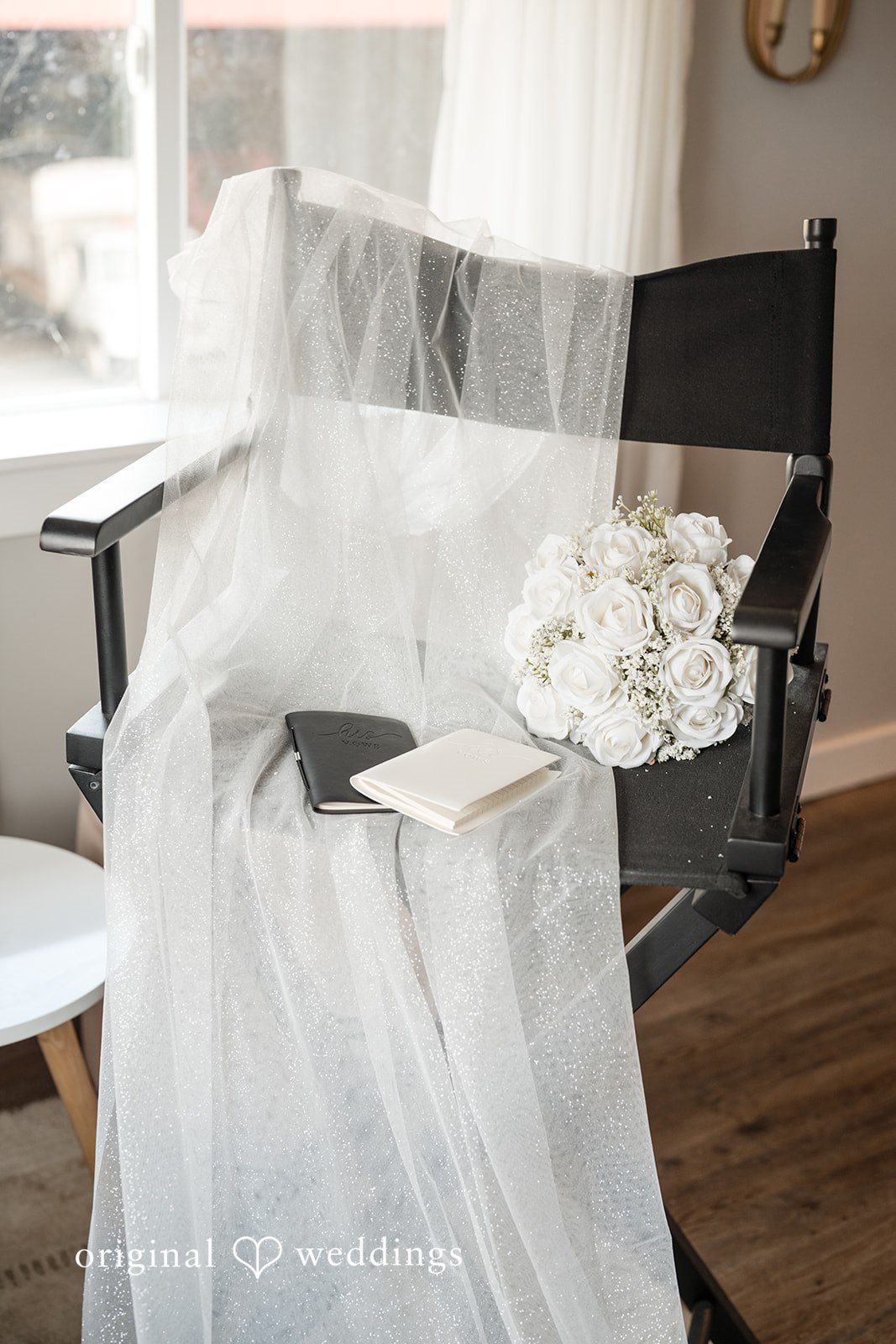 Baylee + Jackson Chair decorated with white flowers