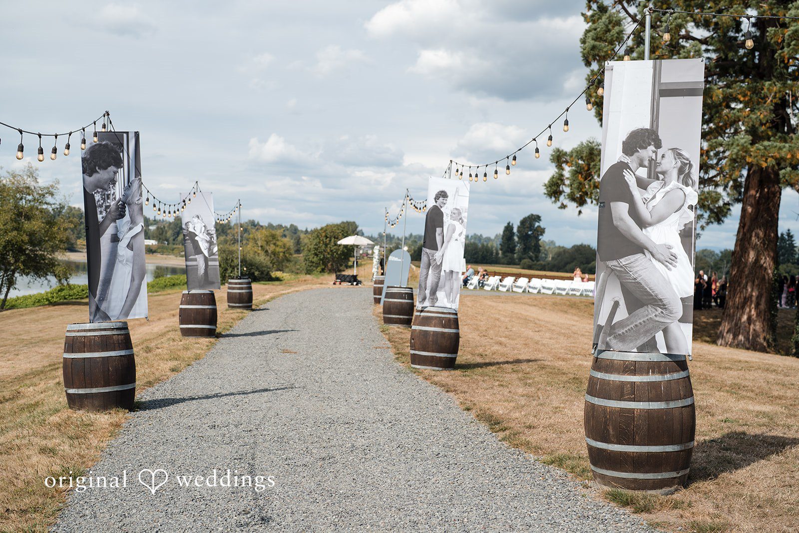Baylee + Jackson Farm path lined with wedding decor at Pemberton Farm