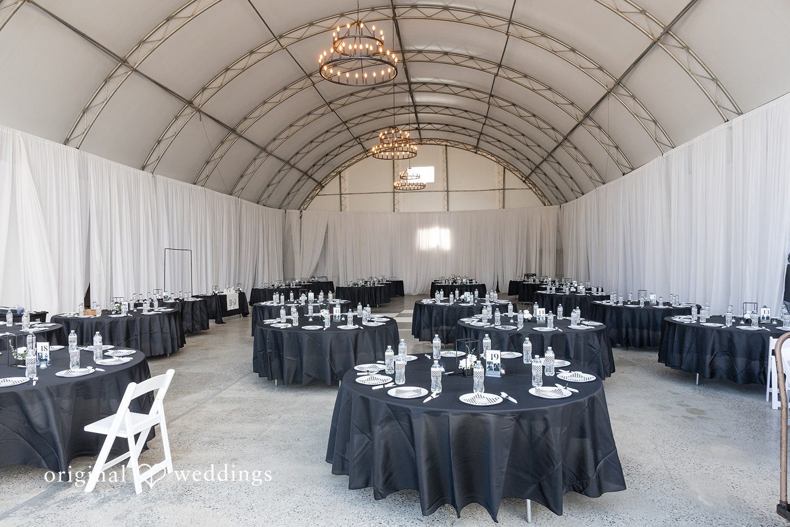 Baylee + Jackson Tented reception with black linens by Seattle wedding photographers at Pemberton Farm