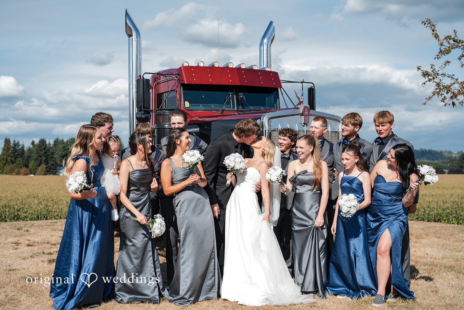 Baylee + Jackson Wedding party by the semi truck