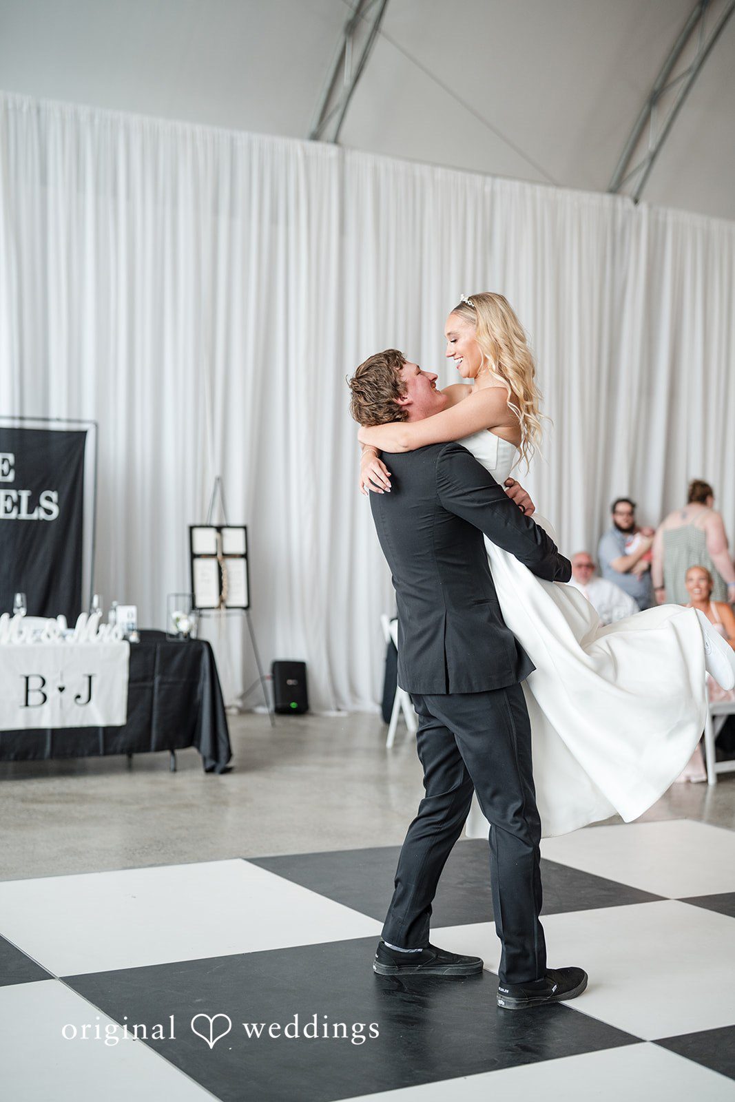 Baylee + Jackson Groom spinning the bride