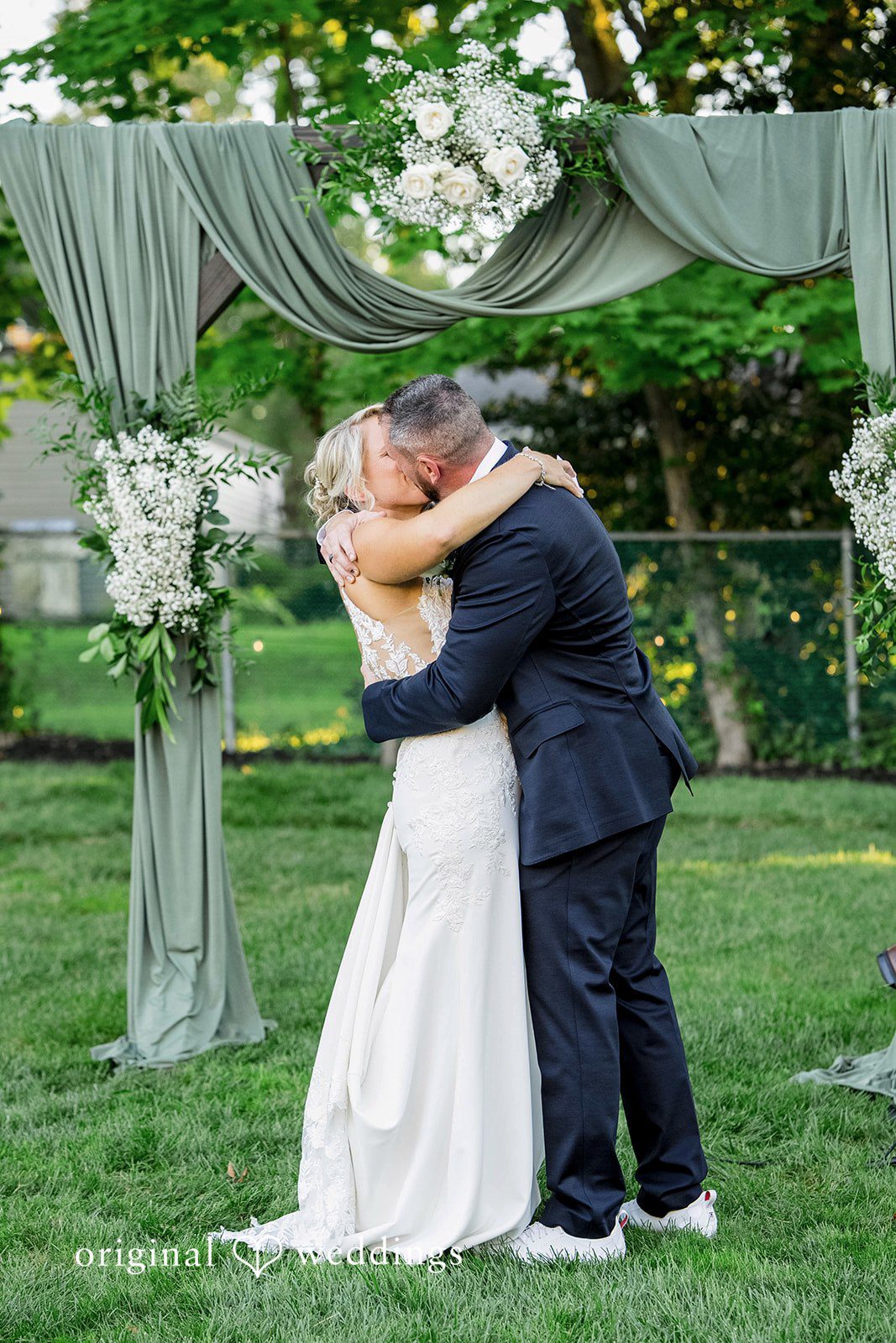 August 29, 2026 – Brittany & Vincent – (ID-5826) Couple's first kiss as newlyweds in a Pennsylvania backyard