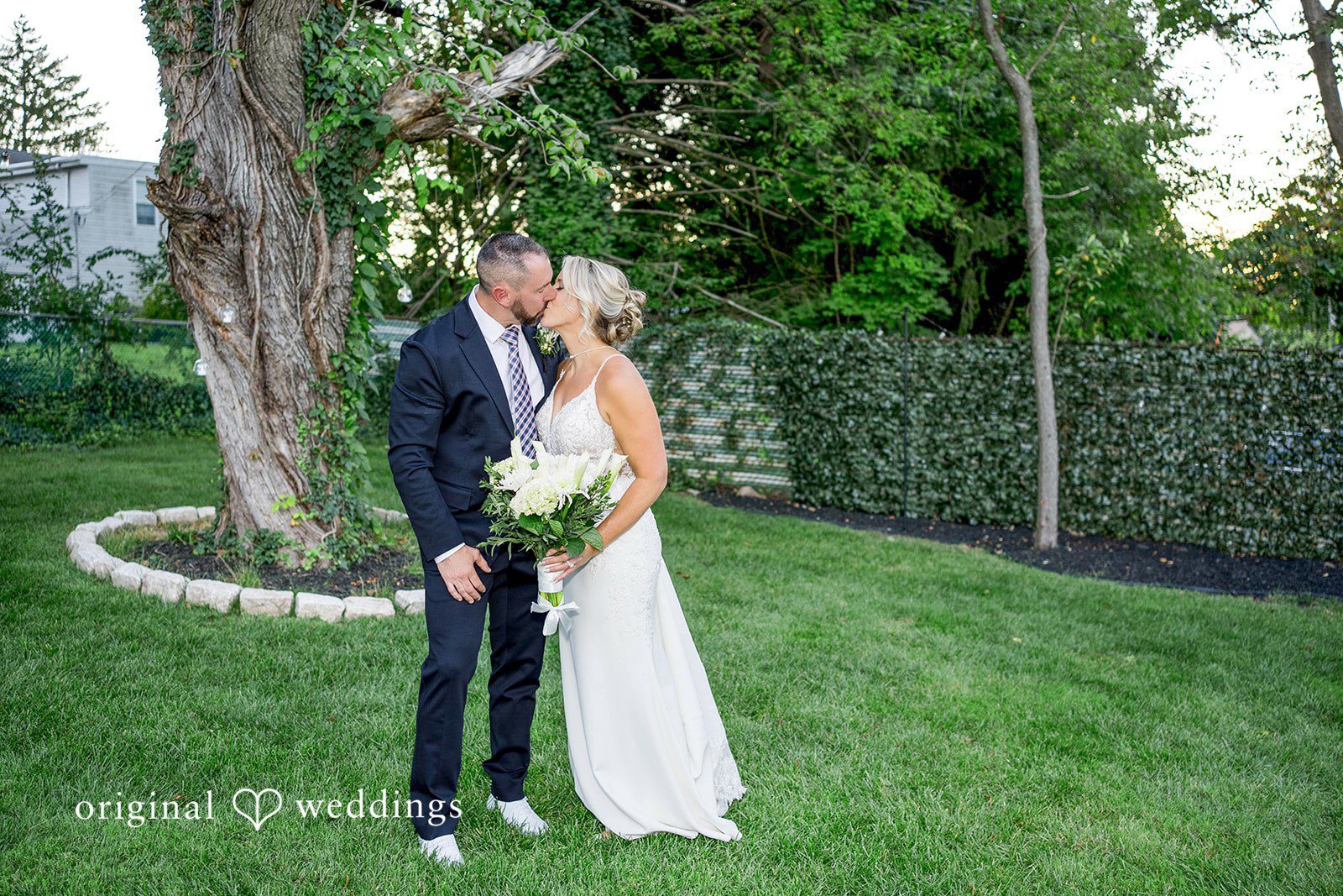 August 29, 2026 – Brittany & Vincent – (ID-5826) Couple kissing under the trees