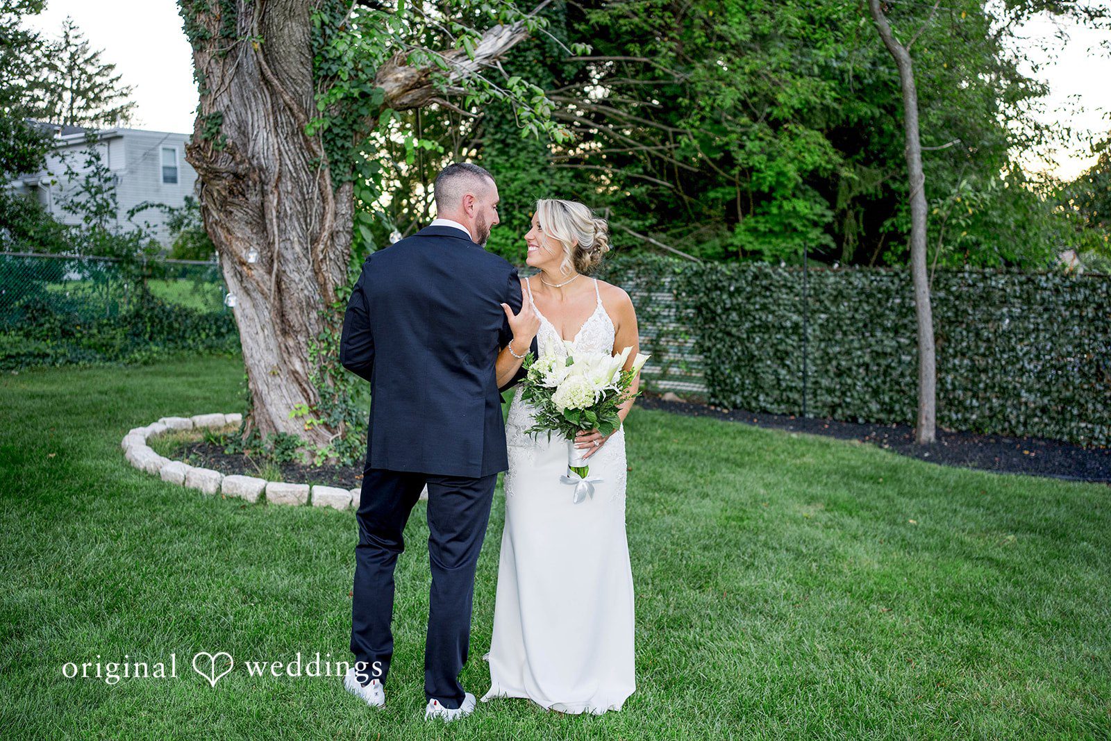 August 29, 2026 – Brittany & Vincent – (ID-5826) Couple facing each other in the backyard